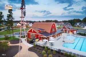 13 Cozy Hvn, Fuquay Varina, NC 27526 - community pool featuring a residential view and a patio area