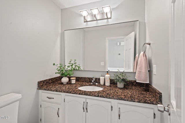 6304 Ansley Ln, Raleigh, NC 27612 - bathroom featuring vanity and toilet