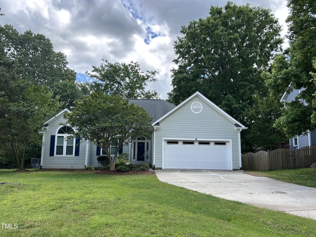 view of front of house featuring driveway and an attached garage