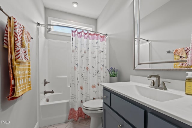 4564 Ashtons Way, Franklinton, NC 27525 - bathroom with tile patterned floors, vanity, toilet, and shower / bath combination with curtain