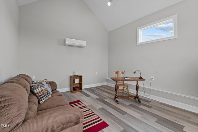 4564 Ashtons Way, Franklinton, NC 27525 - living room featuring a wall mounted air conditioner, vaulted ceiling, light wood-type flooring, an office area, and baseboards