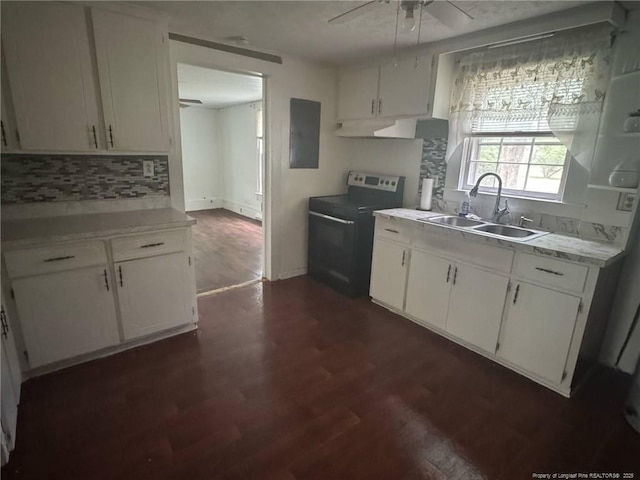 kitchen with electric range oven, a sink, ceiling fan, decorative backsplash, and under cabinet range hood
