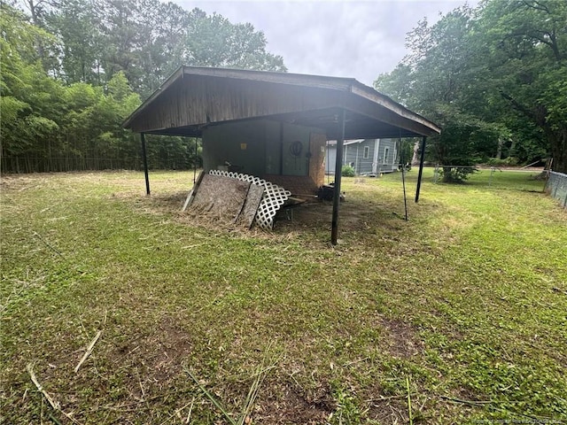 view of yard with a carport