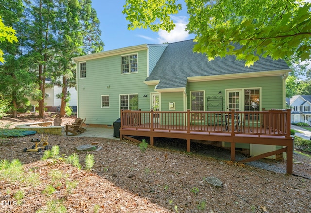 2408 Fordcrest Dr, Apex, NC 27502 - rear view of house featuring a wooden deck, roof with shingles, crawl space, and a patio area
