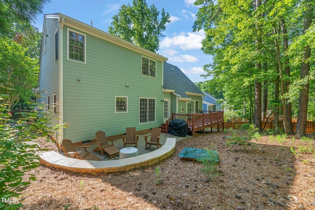 2408 Fordcrest Dr, Apex, NC 27502 - back of house with a wooden deck and a patio