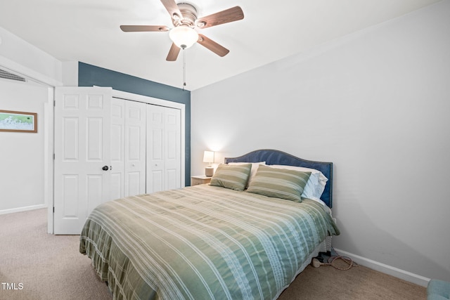 2408 Fordcrest Dr, Apex, NC 27502 - carpeted bedroom featuring a closet, baseboards, and ceiling fan