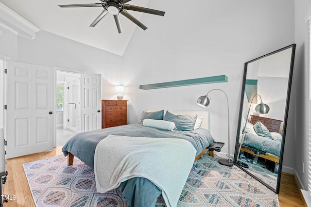 2408 Fordcrest Dr, Apex, NC 27502 - bedroom featuring lofted ceiling, light wood-style floors, and a ceiling fan