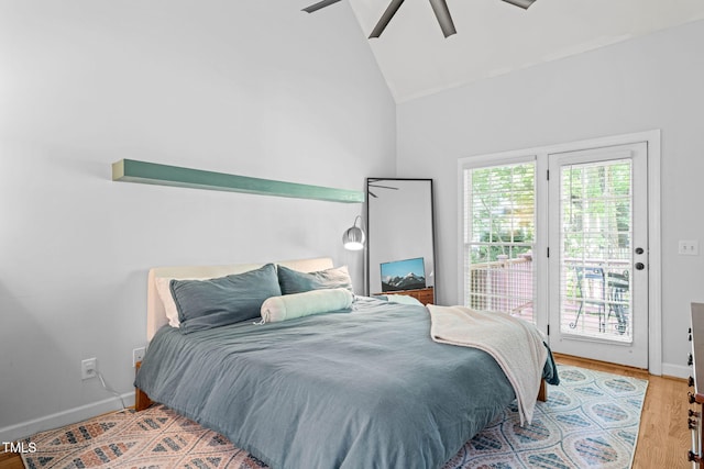 2408 Fordcrest Dr, Apex, NC 27502 - bedroom featuring access to outside, wood finished floors, vaulted ceiling, baseboards, and ceiling fan