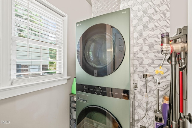 2408 Fordcrest Dr, Apex, NC 27502 - laundry area featuring estacked washer and dryer and wallpapered walls