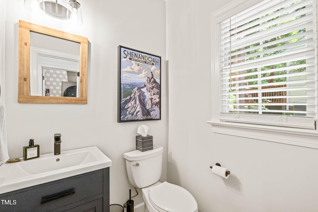 2408 Fordcrest Dr, Apex, NC 27502 - bathroom featuring plenty of natural light, toilet, and vanity