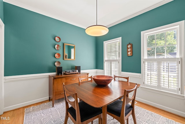 2408 Fordcrest Dr, Apex, NC 27502 - dining room with wood finished floors, crown molding, and baseboards