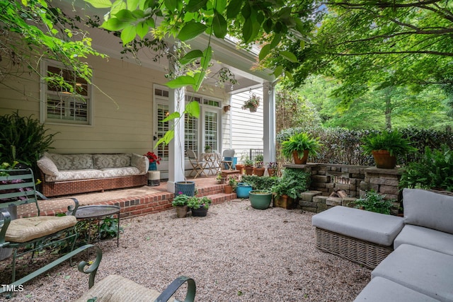 3325 Falls River Ave, Raleigh, NC 27614 - view of patio featuring an outdoor living space