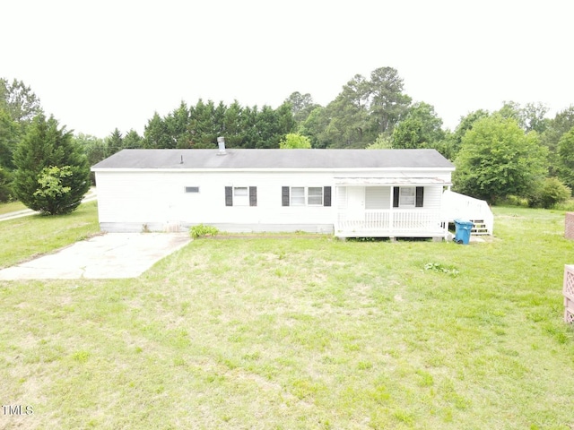 3354 Altamahaw Church St, Elon, NC 27244 - back of house with a lawn, a deck, and view of wooded area