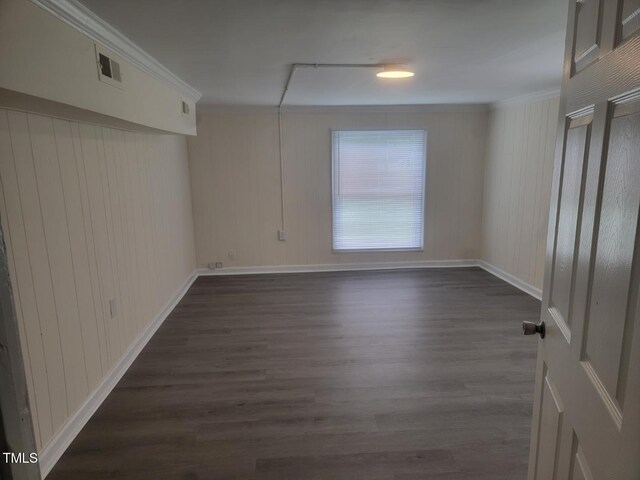 3354 Altamahaw Church St, Elon, NC 27244 - spare room featuring dark wood-type flooring, ornamental molding, and baseboards