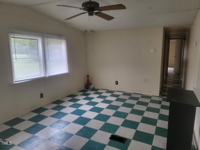 3354 Altamahaw Church St, Elon, NC 27244 - empty room featuring a ceiling fan and vaulted ceiling