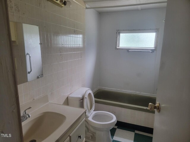 3354 Altamahaw Church St, Elon, NC 27244 - bathroom featuring tile walls, toilet, and vanity