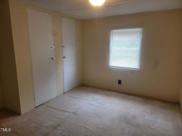 3354 Altamahaw Church St, Elon, NC 27244 - unfurnished bedroom featuring carpet flooring