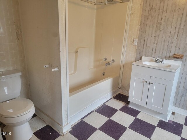3354 Altamahaw Church St, Elon, NC 27244 - bathroom with tile patterned floors, toilet, vanity, and shower / washtub combination