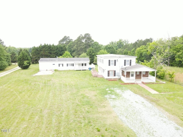 3354 Altamahaw Church St, Elon, NC 27244 - view of front of house featuring driveway and a front lawn