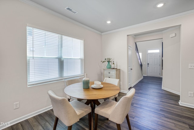 1007 Sora Way, Durham, NC 27703 - dining area with baseboards, dark wood-style flooring, crown molding, and recessed lighting