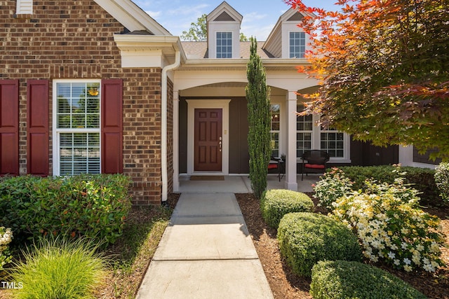 211 Ibis Ln, Durham, NC 27703 - entrance to property with brick siding and covered porch
