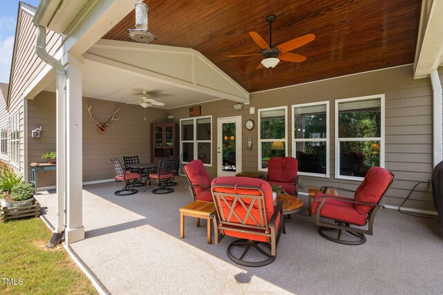 211 Ibis Ln, Durham, NC 27703 - view of patio with a ceiling fan and outdoor dining area