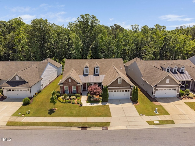 211 Ibis Ln, Durham, NC 27703 - view of front of house with driveway, a front lawn, and a garage