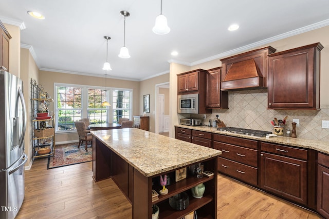 211 Ibis Ln, Durham, NC 27703 - kitchen featuring stainless steel appliances, premium range hood, open shelves, light wood-style floors, and decorative backsplash