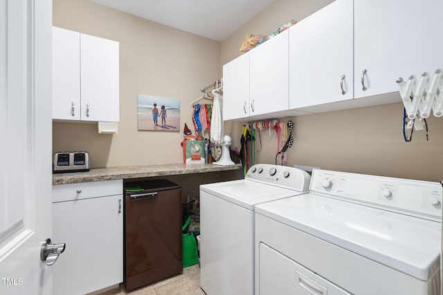 211 Ibis Ln, Durham, NC 27703 - washroom with washing machine and dryer, cabinet space, and light tile patterned floors