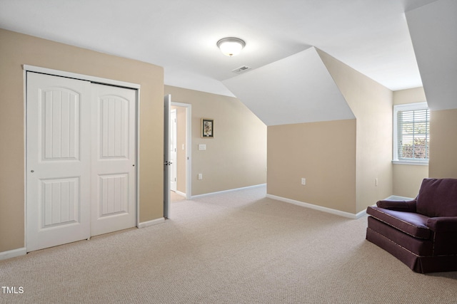 211 Ibis Ln, Durham, NC 27703 - sitting room featuring light carpet, baseboards, and vaulted ceiling