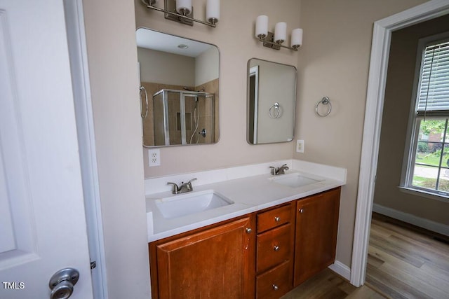10 London Way, Spring Lake, NC 28390 - full bath with a shower stall, wood finished floors, and double vanity