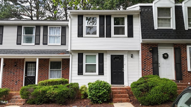 7719 Kingsberry Ct, Raleigh, NC 27615 - view of front of property with brick siding and a shingled roof