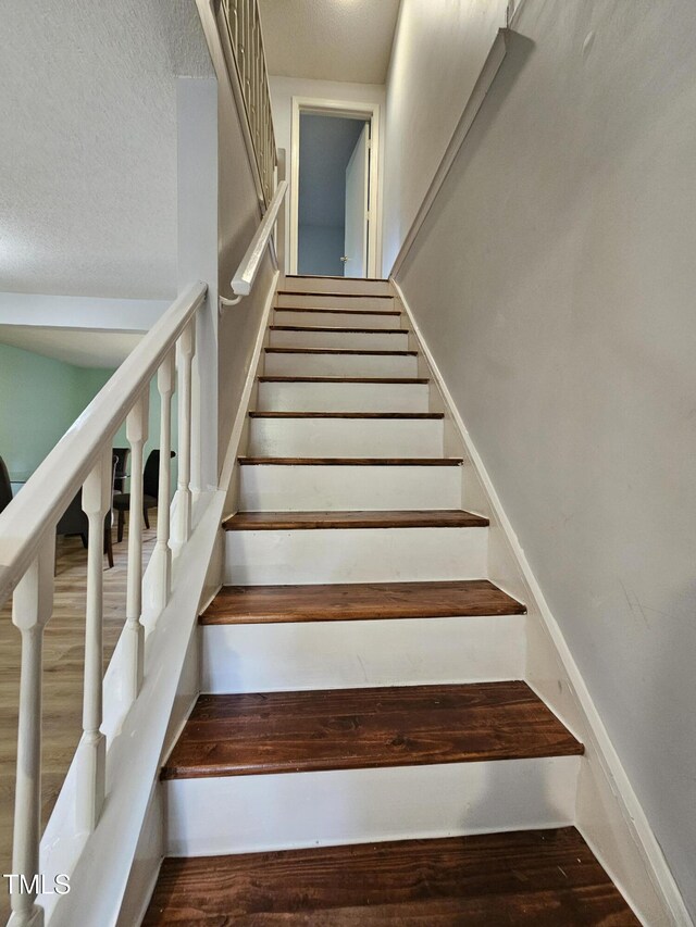 7719 Kingsberry Ct, Raleigh, NC 27615 - stairway with wood finished floors