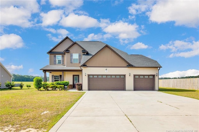 341 Woodington Rd, Hope Mills, NC 28348 - craftsman-style home with an attached garage, driveway, and board and batten siding