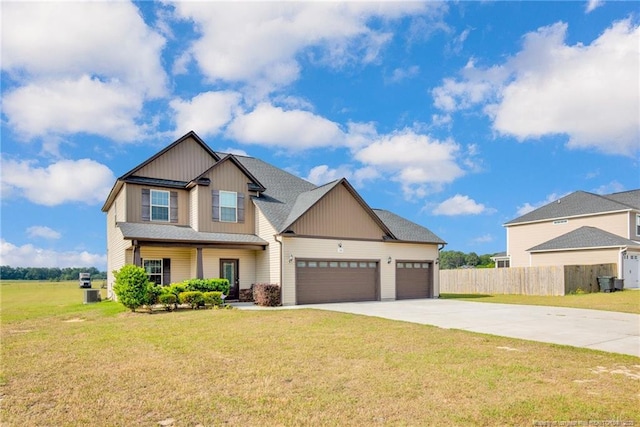 341 Woodington Rd, Hope Mills, NC 28348 - craftsman-style home with concrete driveway, a garage, board and batten siding, and central AC unit