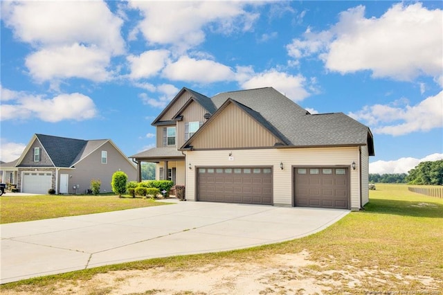 341 Woodington Rd, Hope Mills, NC 28348 - craftsman inspired home with driveway, board and batten siding, a front yard, and a garage