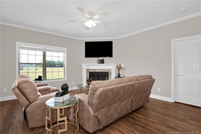 341 Woodington Rd, Hope Mills, NC 28348 - living area featuring wood finished floors, ceiling fan, baseboards, crown molding, and a fireplace