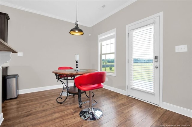 341 Woodington Rd, Hope Mills, NC 28348 - dining room featuring ornamental molding, wood finished floors, and baseboards