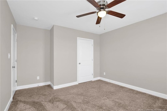 341 Woodington Rd, Hope Mills, NC 28348 - unfurnished bedroom with carpet, baseboards, and a ceiling fan