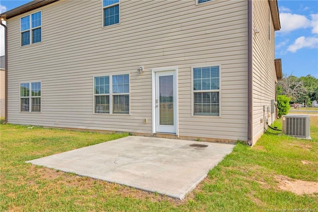 341 Woodington Rd, Hope Mills, NC 28348 - back of house featuring cooling unit, a patio area, and a lawn