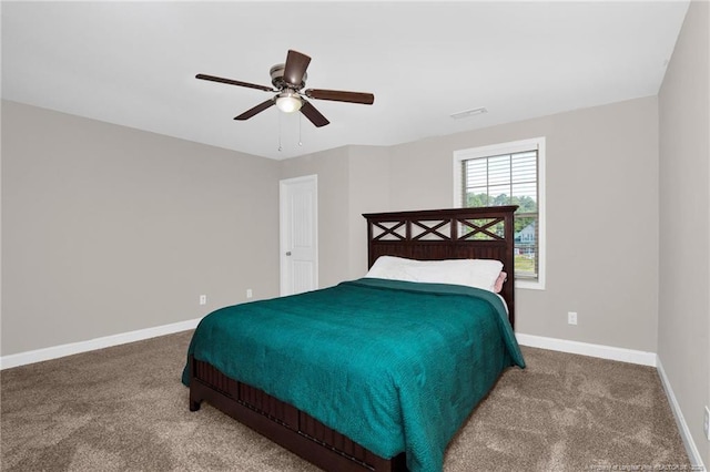 341 Woodington Rd, Hope Mills, NC 28348 - carpeted bedroom featuring baseboards and ceiling fan