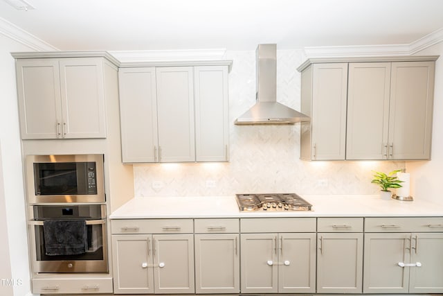 2918 Heirloom Way, Apex, NC 27502 - kitchen with stainless steel appliances, wall chimney exhaust hood, ornamental molding, light countertops, and decorative backsplash