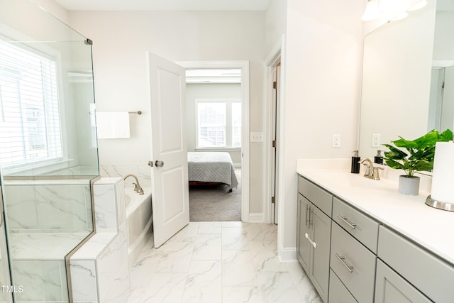 2918 Heirloom Way, Apex, NC 27502 - full bathroom with vanity, a bath, marble look tile flooring, ensuite bathroom, and baseboards