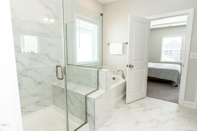 2918 Heirloom Way, Apex, NC 27502 - bathroom with a garden tub, marble look tiles, a marble finish shower, and ensuite bathroom