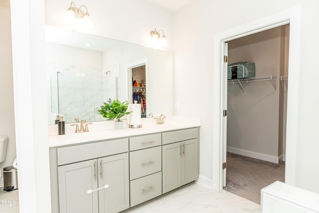 2918 Heirloom Way, Apex, NC 27502 - bathroom featuring double vanity, a marble finish shower, a walk in closet, toilet, and marble finish floors