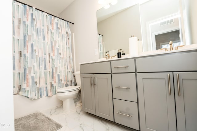 2918 Heirloom Way, Apex, NC 27502 - bathroom featuring marble look tile flooring, toilet, and double vanity