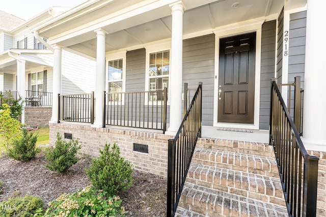 2918 Heirloom Way, Apex, NC 27502 - property entrance with a porch and crawl space
