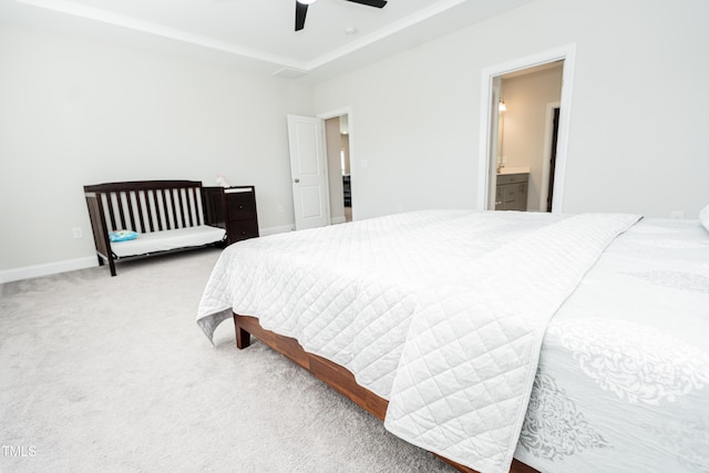 2918 Heirloom Way, Apex, NC 27502 - carpeted bedroom with baseboards, a ceiling fan, and ensuite bathroom