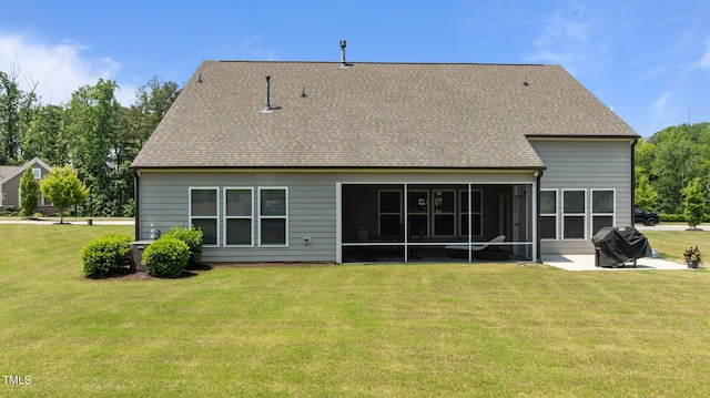 1112 Monterey Bay Dr, Wake Forest, NC 27587 - back of property featuring a sunroom, a yard, and roof with shingles