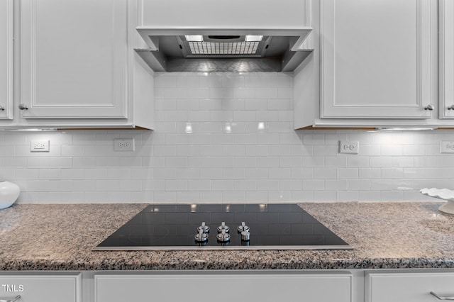 1112 Monterey Bay Dr, Wake Forest, NC 27587 - kitchen featuring black electric cooktop, premium range hood, white cabinets, and tasteful backsplash